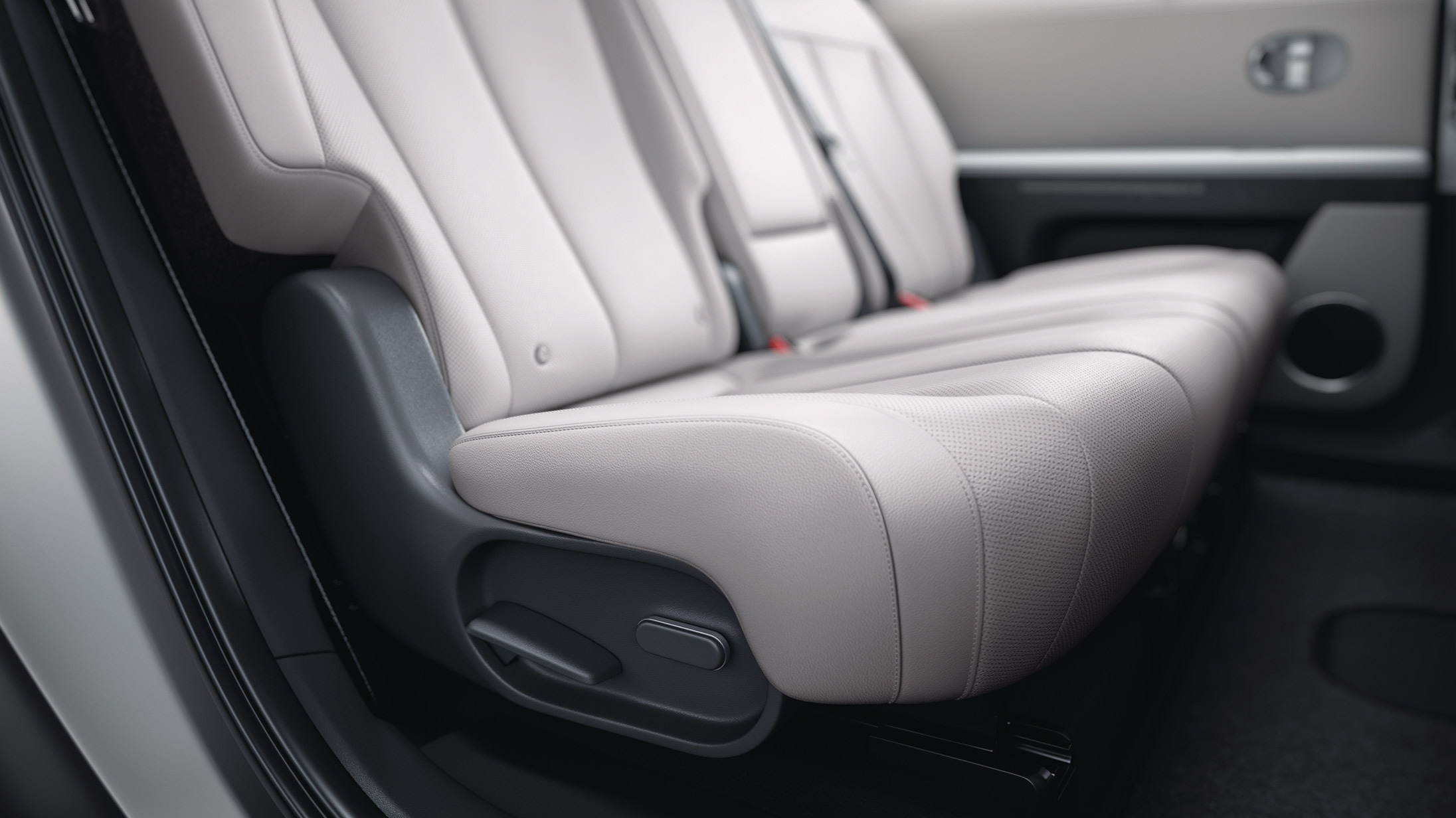 Power sliding rear seats with manual reclining